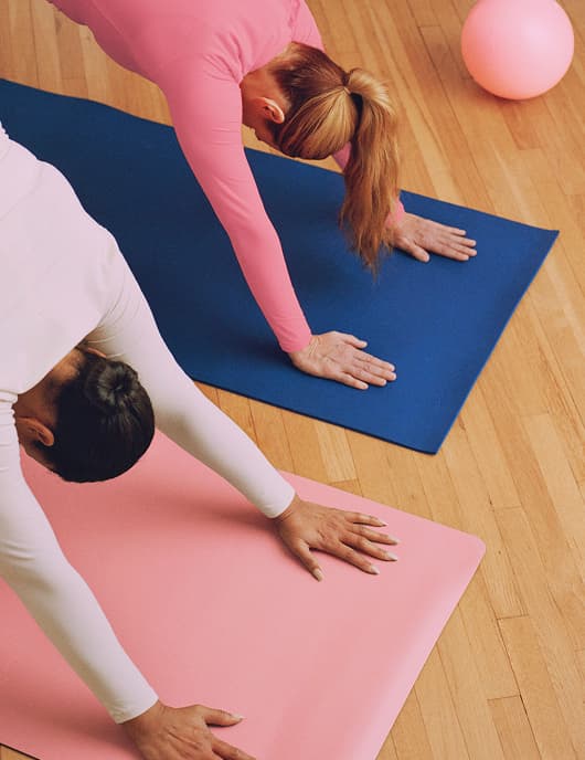 woman closing her eyes near the ocean