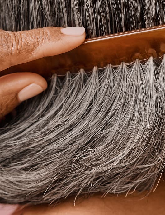 woman looking in a mirror